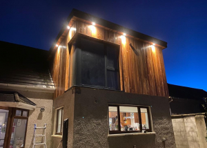 Completed upstairs building extension with lights